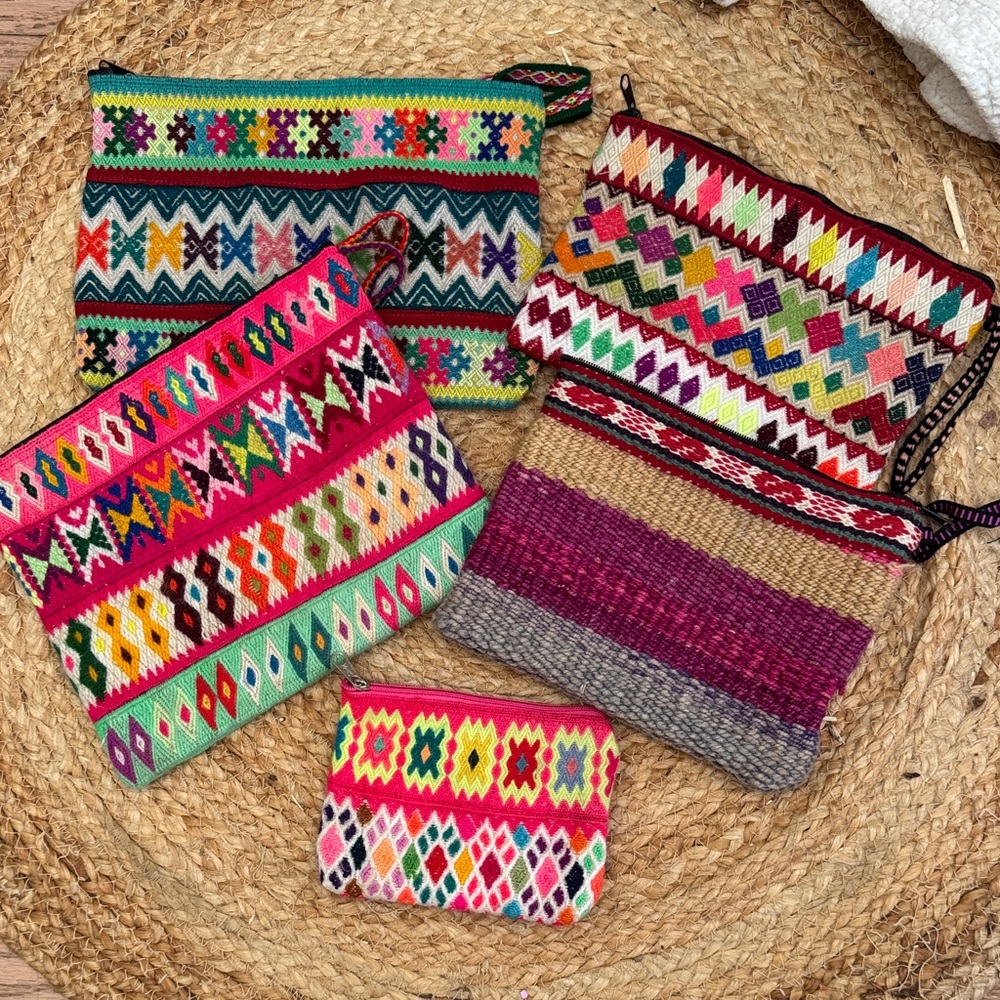 Peru purse wristlet lot.  All inner lined with black nylon. Zipper closure